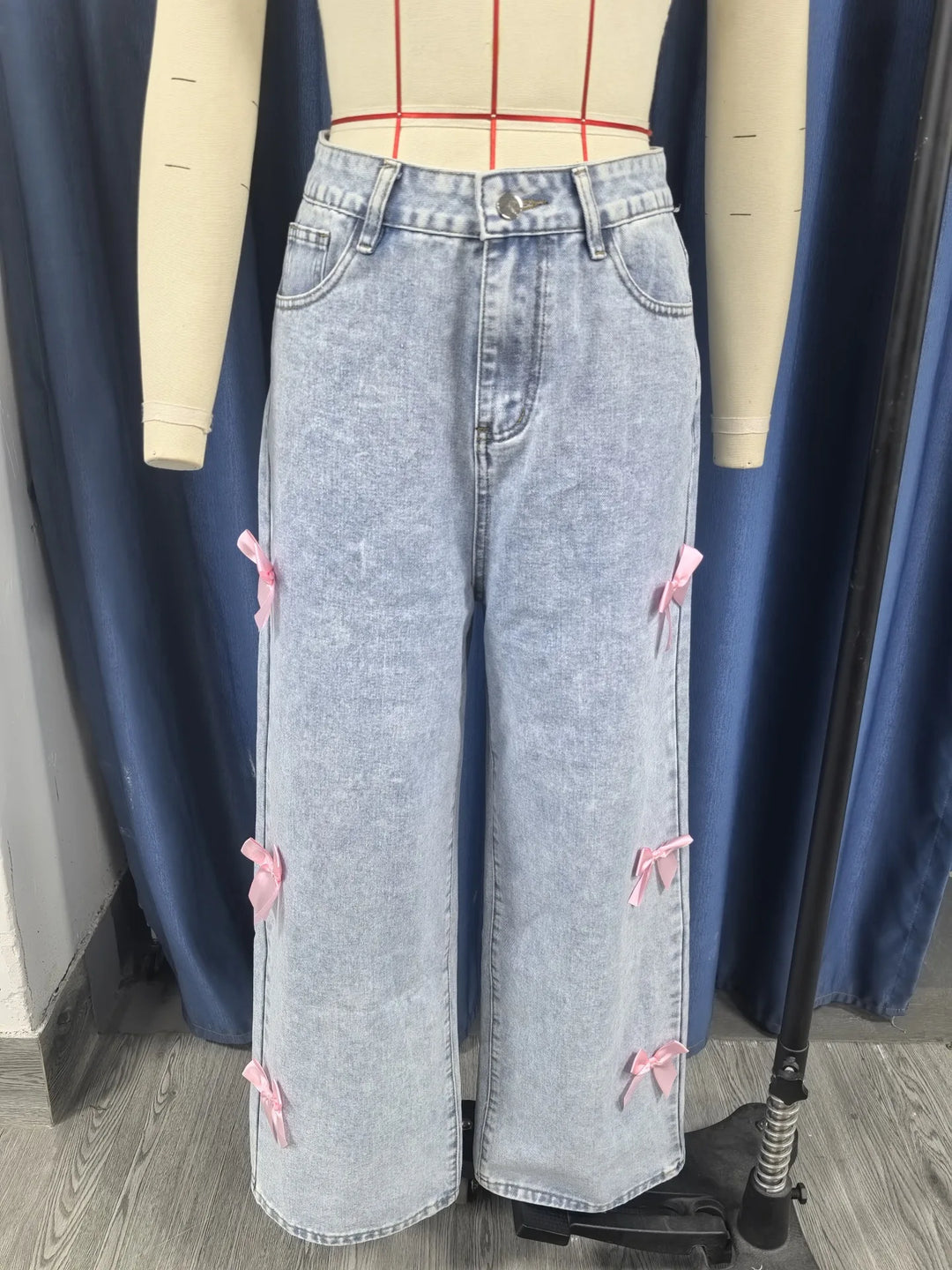 Vintage Distressed High-Waisted Jeans with Bow Detail
