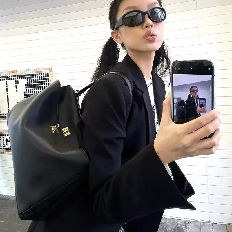 KELLIE | High-end Lock Armpit Leather Rodeo Bag