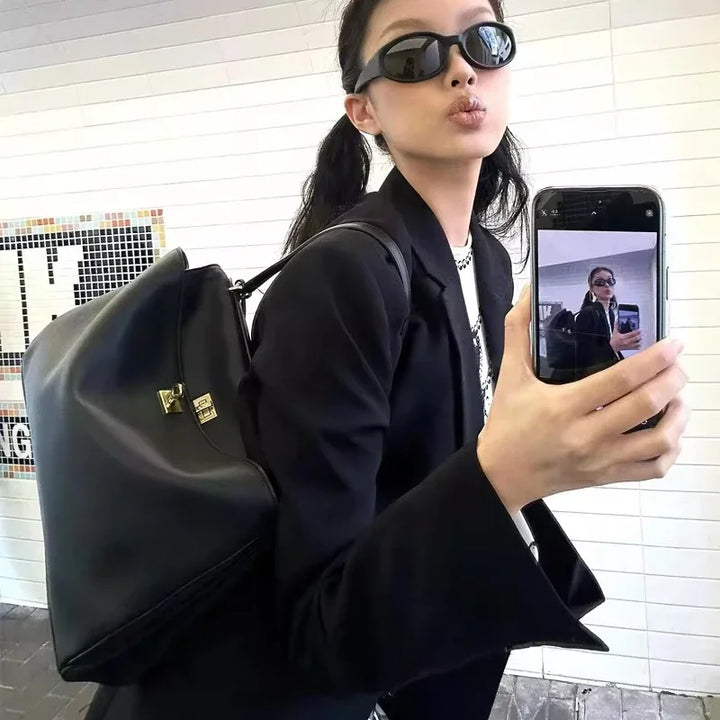 KELLIE | High-end Lock Armpit Leather Rodeo Bag