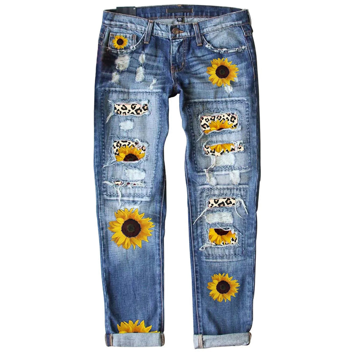 High-Waisted Blue Floral Print Stretch Jeans with Ripped Details