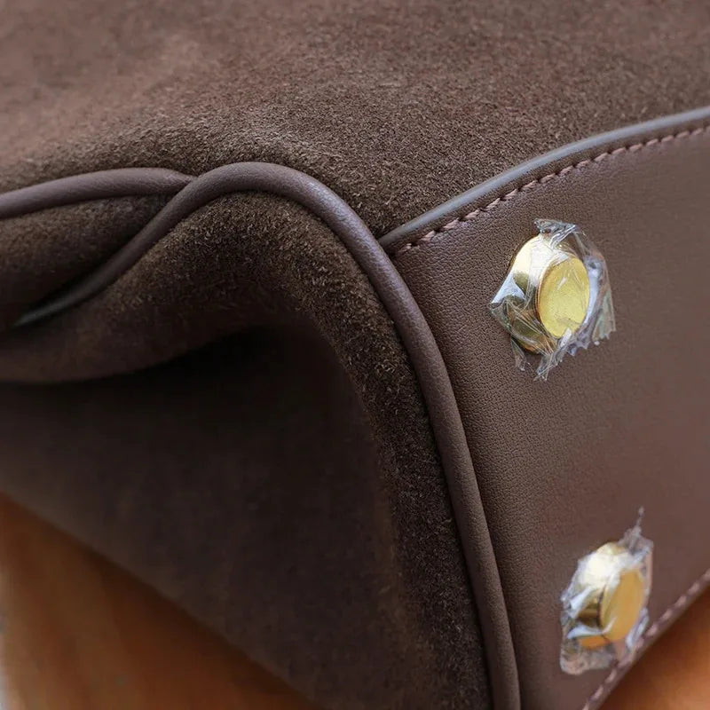 RUMEA | Cowhide Leather Rodeo Tote Bag