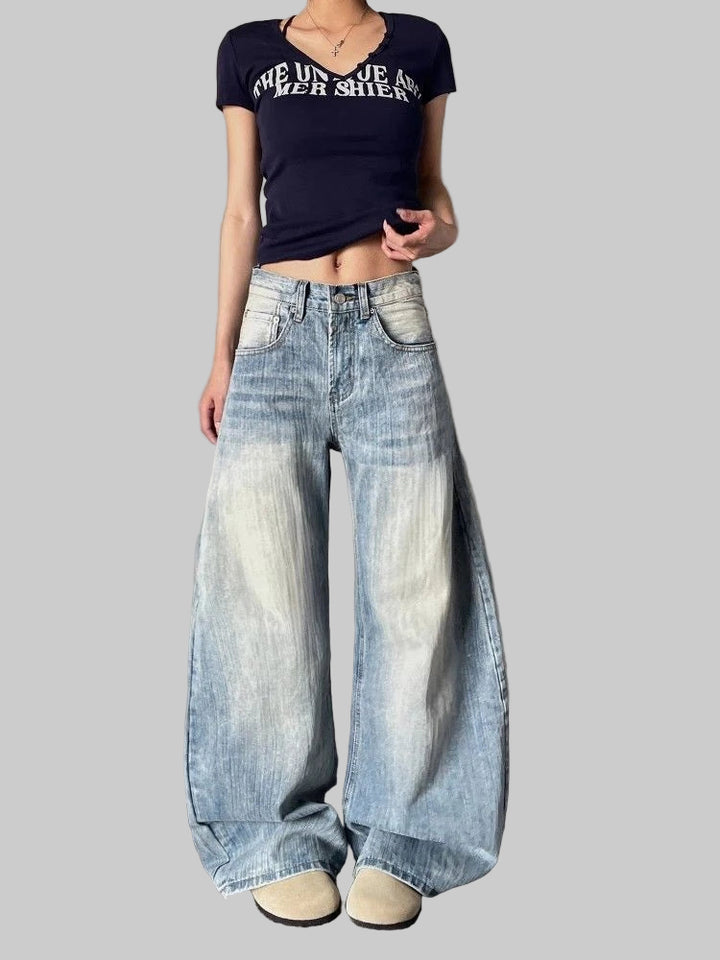 Washed Curved Wide Leg Denim Jeans