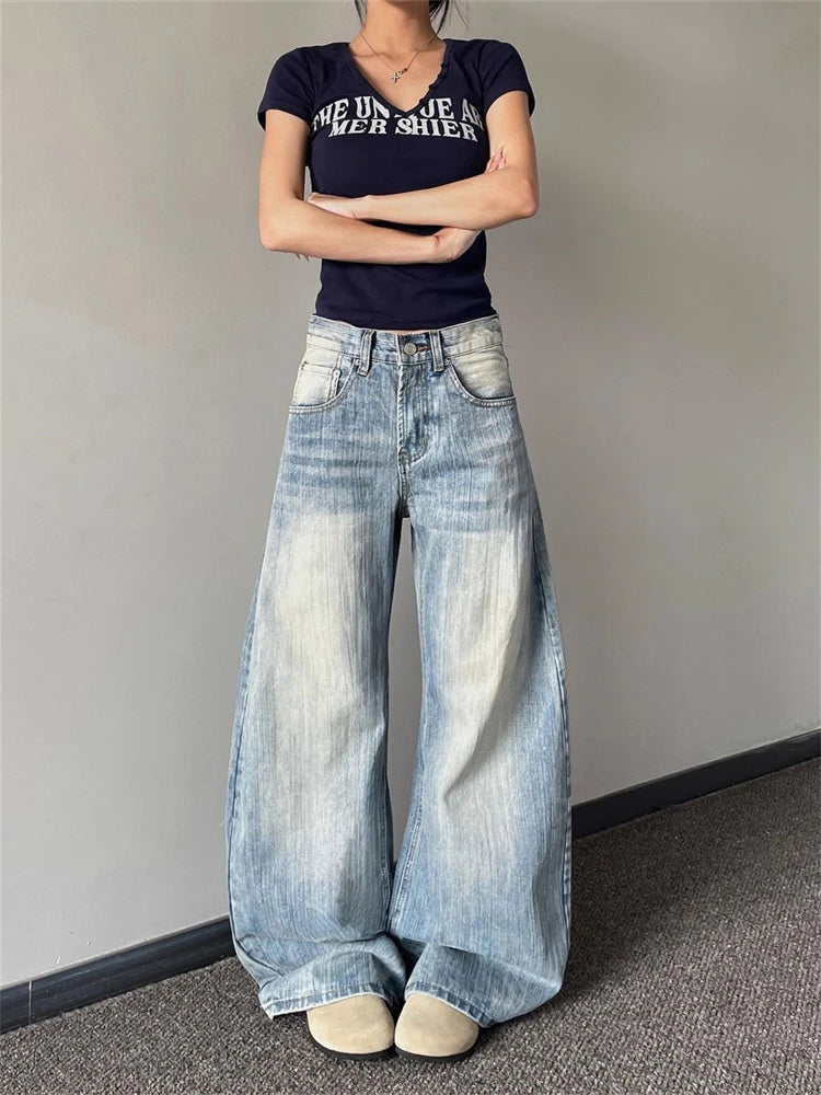 Washed Curved Wide Leg Denim Jeans