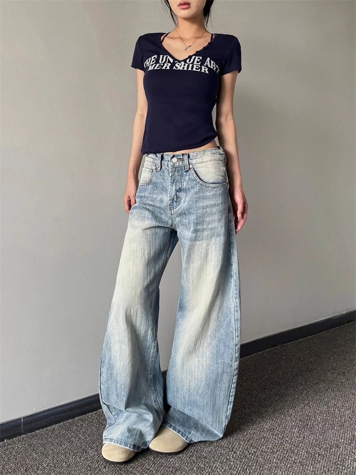 Washed Curved Wide Leg Denim Jeans