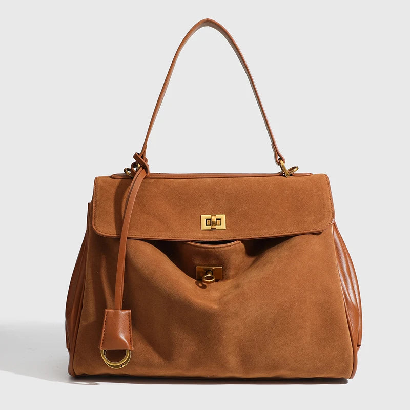 KELLIE | High-end Lock Armpit Leather Rodeo Bag