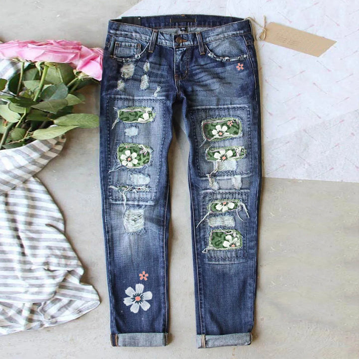 High-Waisted Blue Floral Print Stretch Jeans with Ripped Details