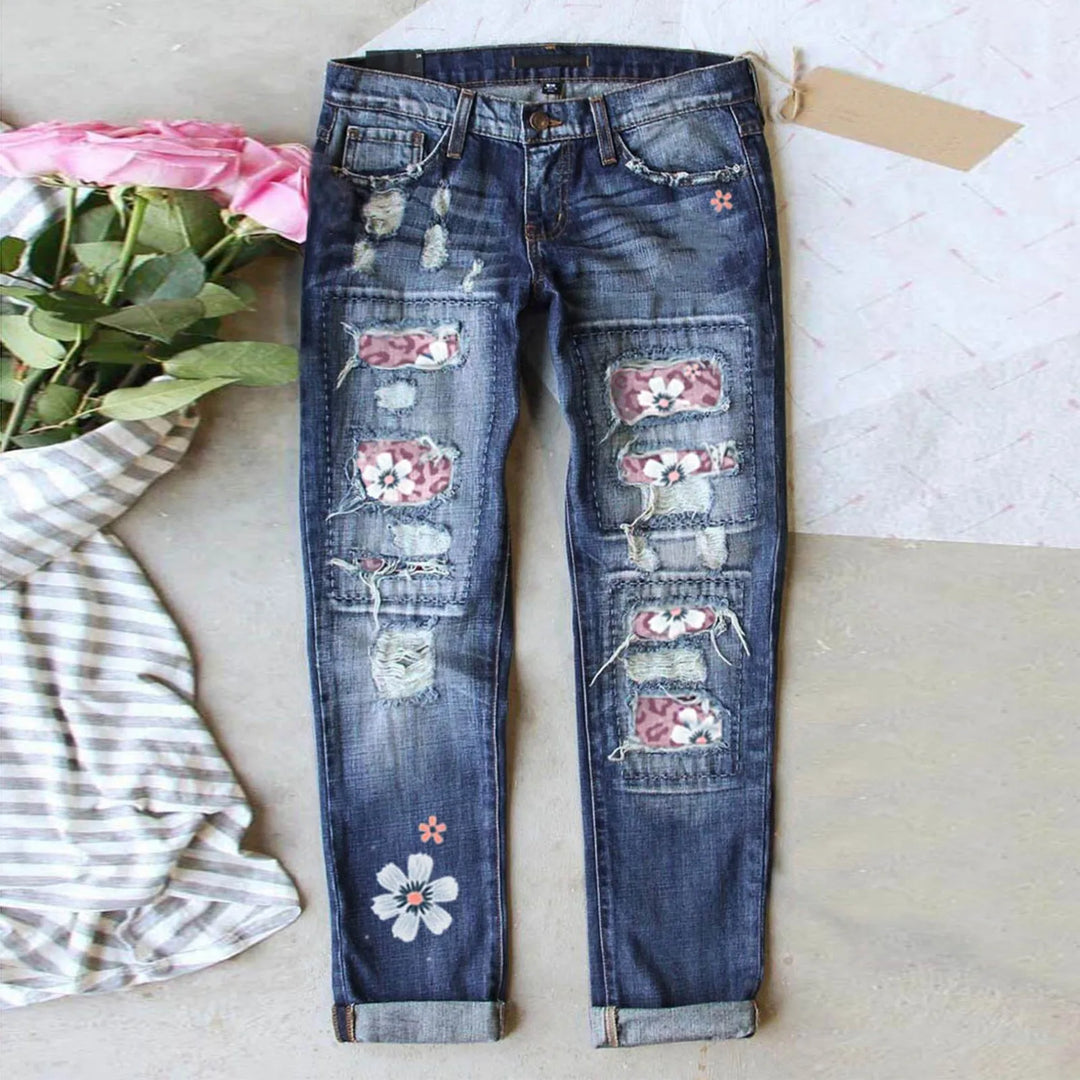 High-Waisted Blue Floral Print Stretch Jeans with Ripped Details