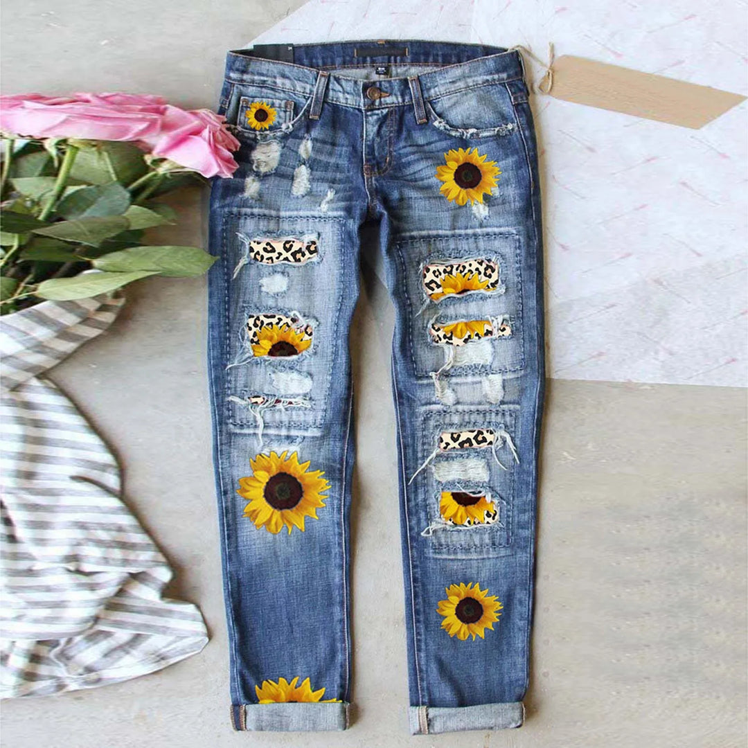 High-Waisted Blue Floral Print Stretch Jeans with Ripped Details