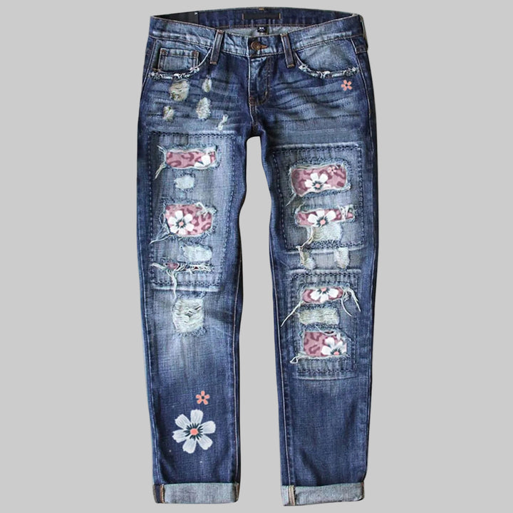 High-Waisted Blue Floral Print Stretch Jeans with Ripped Details